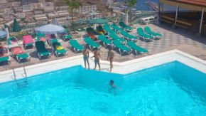 One bedroom appartement with sea view shared pool and furnished terrace at Mogan 1 km away from the beach, Mogán